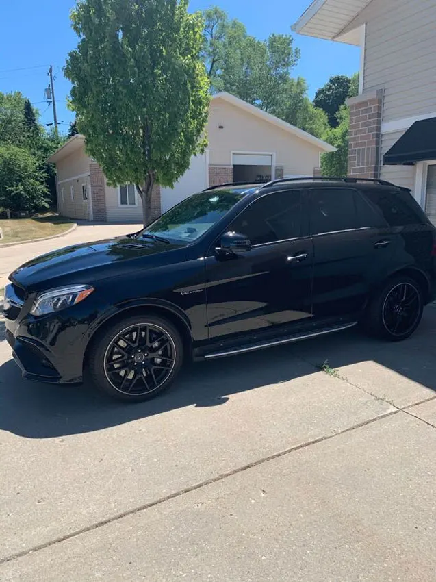 Black Mercedes SUV with fresh window tint